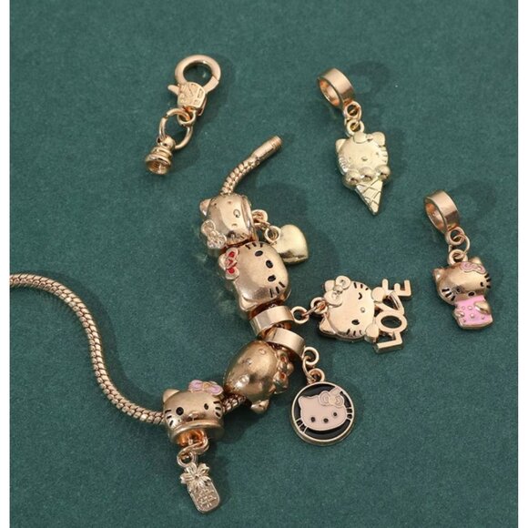 Hello Kitty Gold-Tone Charm Bracelet – Love, Ice Cream & Heart Charms - Picture 2 of 5